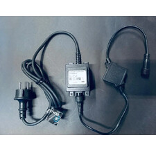 Трансформатор 220/24 В , усиленная влагозащита IP65, герметичный, 30 Вт, шнур подключения  с выпрямителем тока 1.5 м. черный